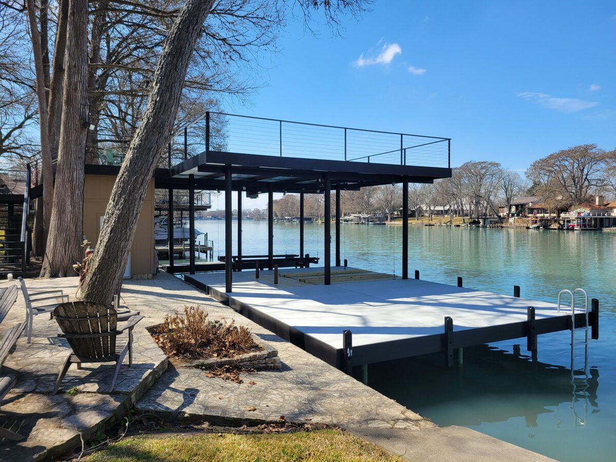 Boathouse with jet ski pivot